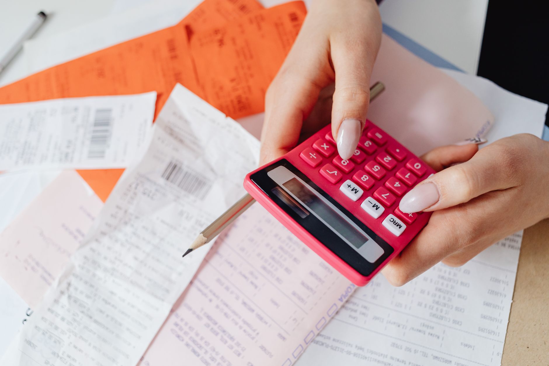 Calculator and paperwork on a desk