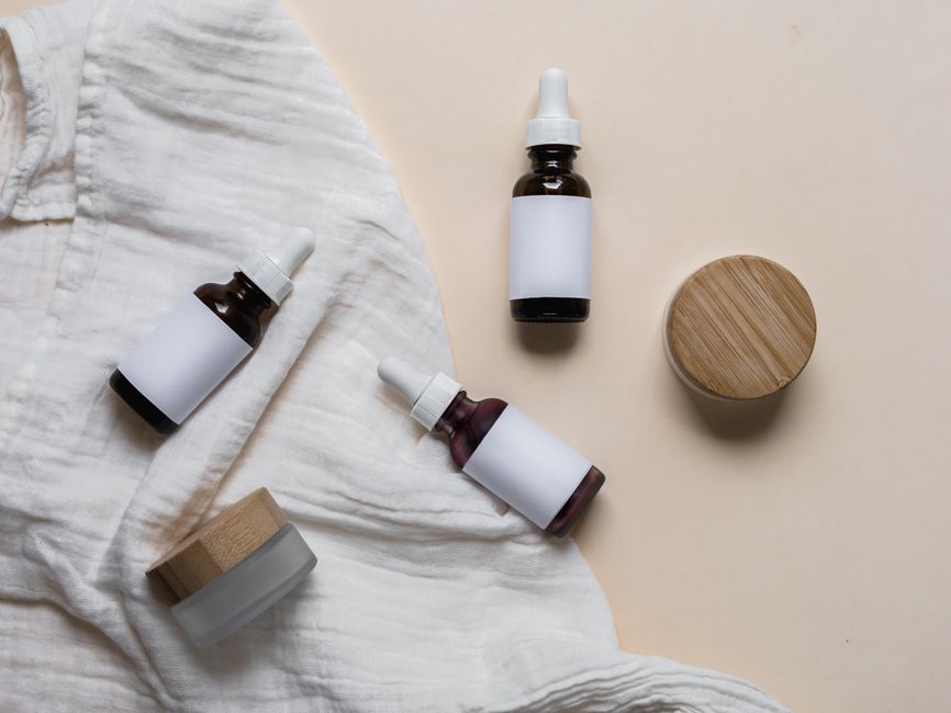 Skincare serum and cream bottles